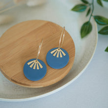 Load image into Gallery viewer, Lolita in DARK BLUE, a Matte Disc on a 24 karat Gold-Plated Hoop. Choice of 5 charms.