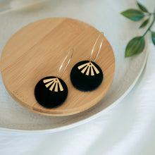 Load image into Gallery viewer, Lolita in BLACK, a Matte Disc on a 24 karat Gold-Plated Hoop. Choice of 5 charms.