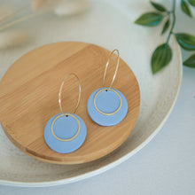 Load image into Gallery viewer, Lolita in SKY BLUE, a Matte Disc on a 24 karat Gold-Plated Hoop. Choice of 5 charms.
